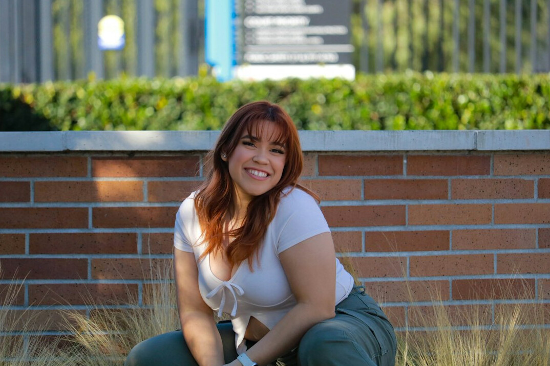 Portrait of a professional Latina woman editor smiling