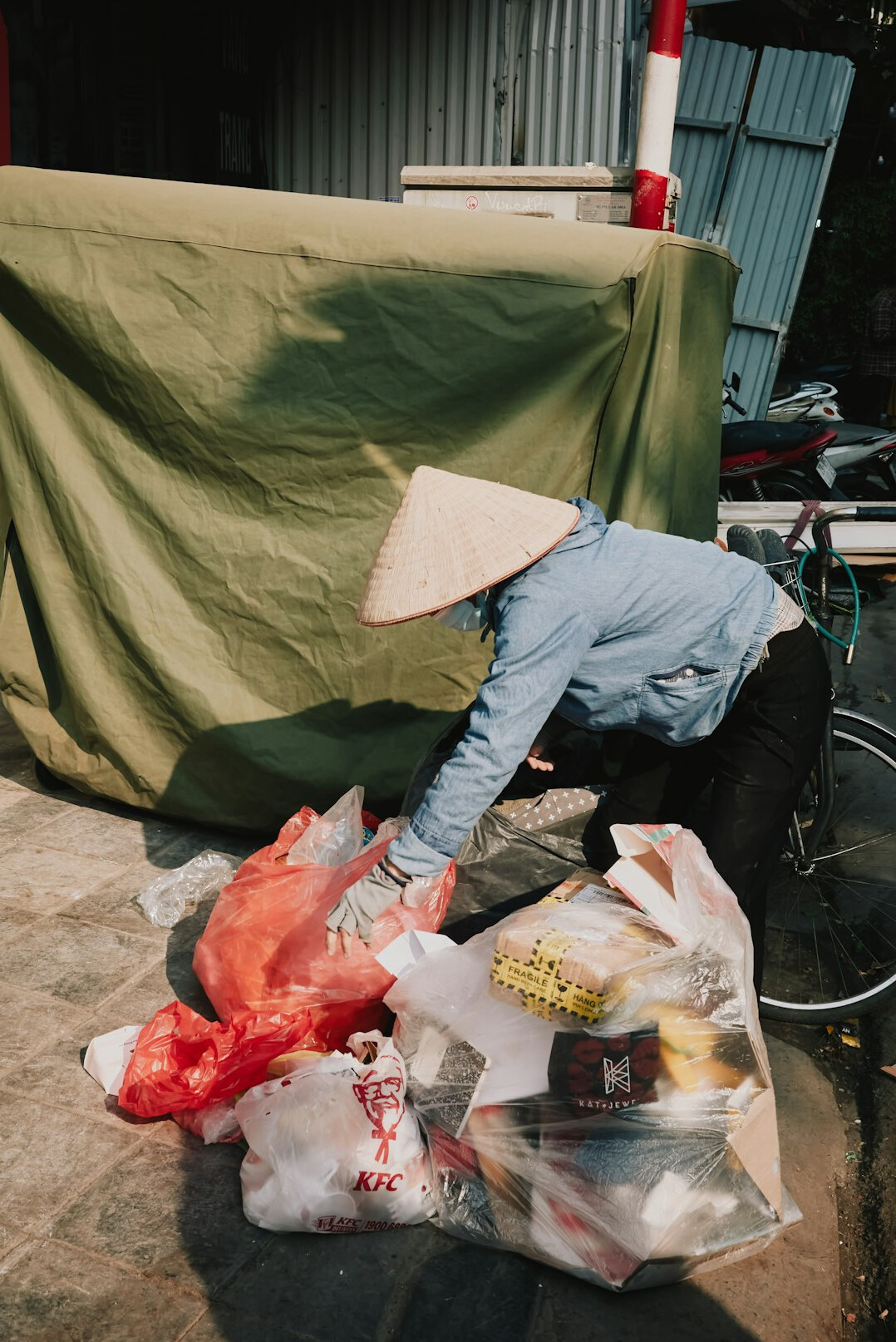 woman hiding items in bag
