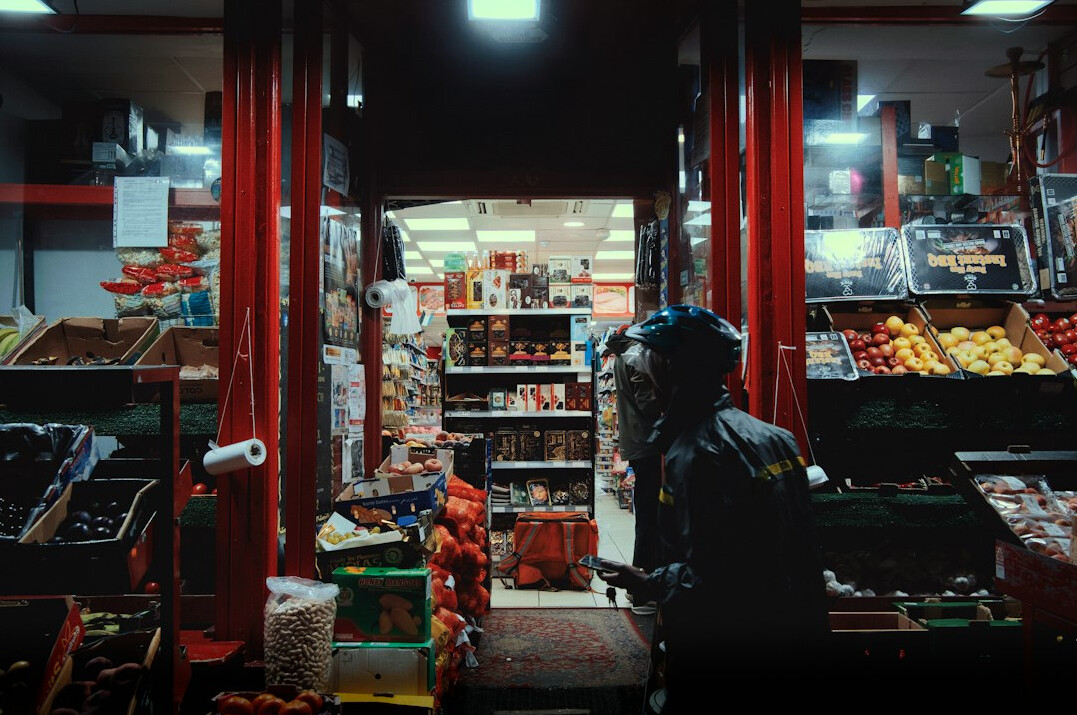 store detective catching thief