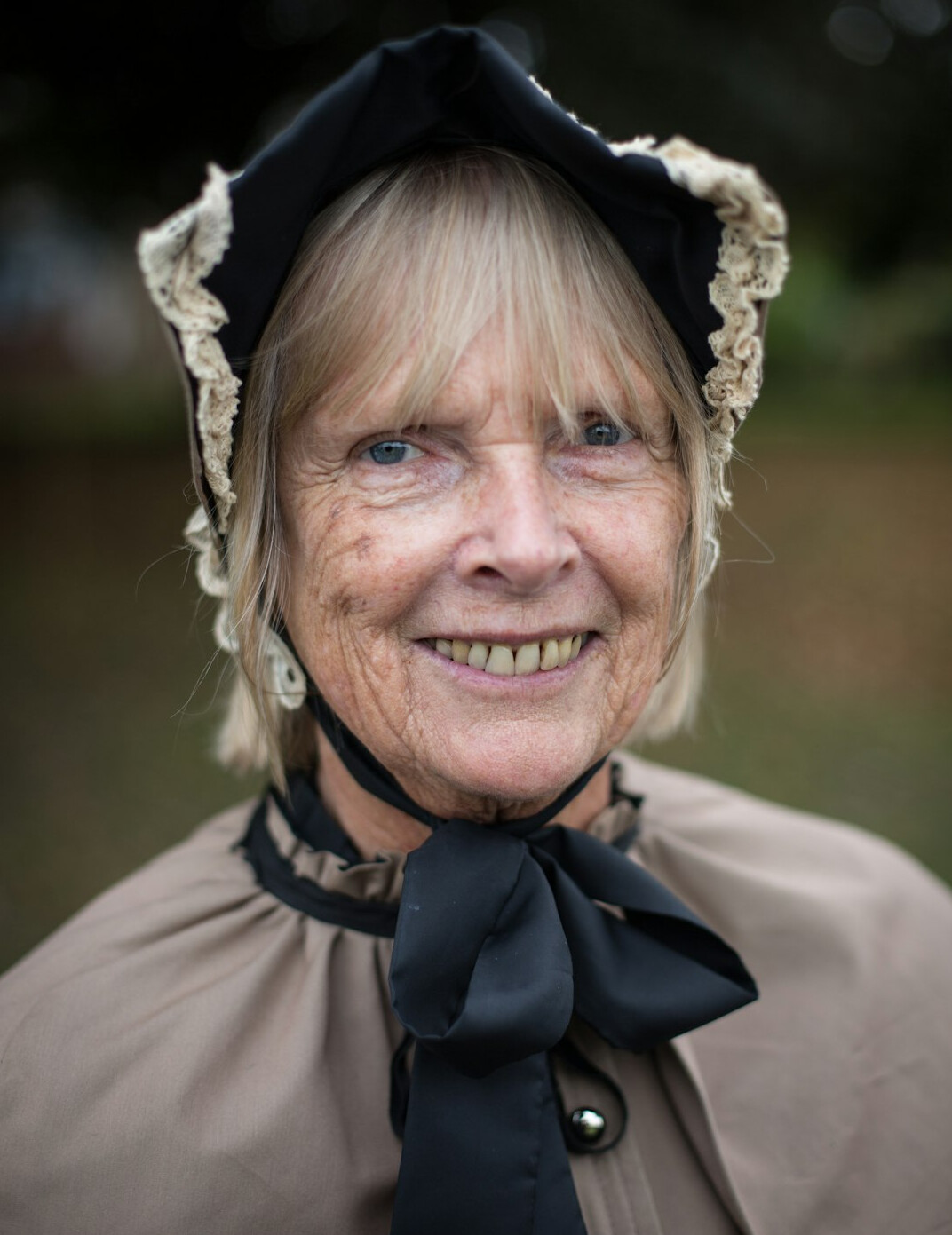 Portrait of a woman historian with warm smile
