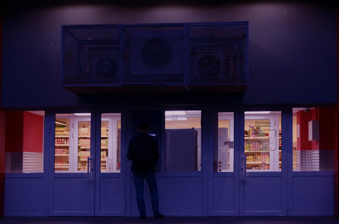 store detective watching customers